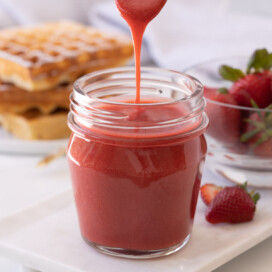 Fresh strawberry coulis, ready for a stack of waffles and breakfast.