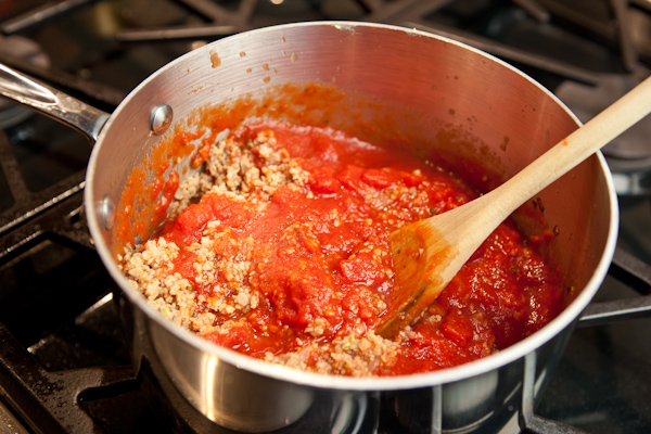 Sauce for lasagna simmering.