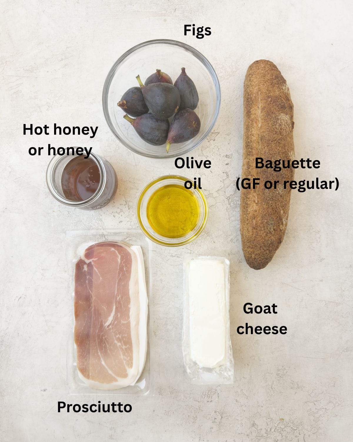Figs, baguette, olive oil, goat cheese and prosciutto to make crostini.