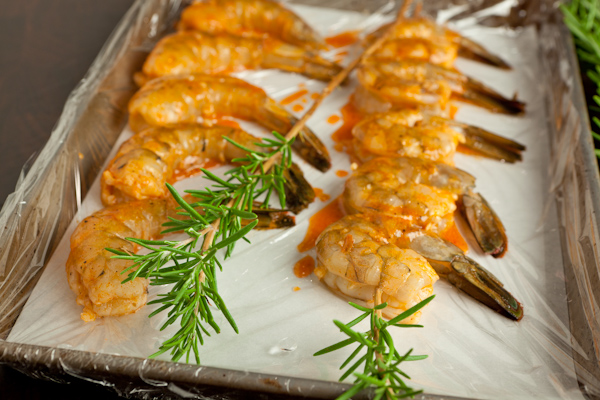 Raw shrimp skewered for the grill.