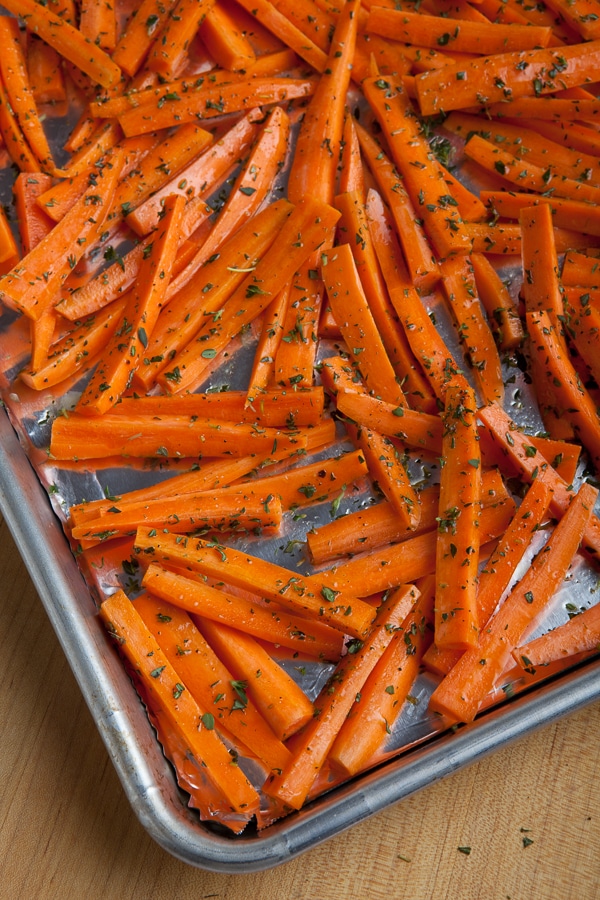 Prepped carrots on sheet tray for roasting.