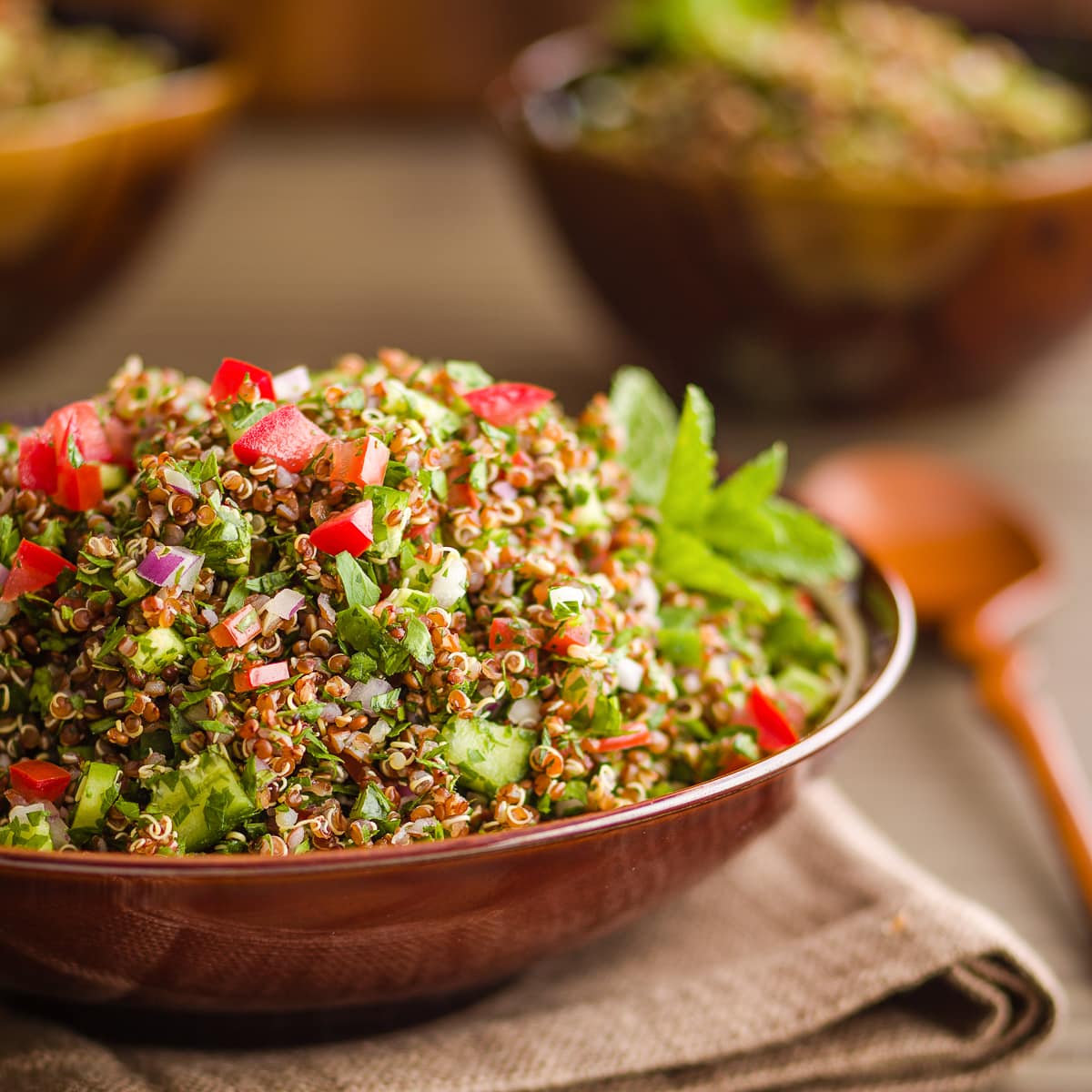 Bowl of quinoa tabouleh salad.