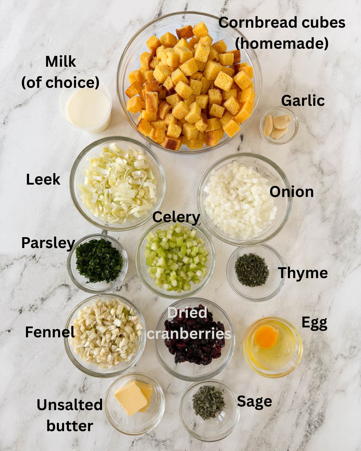 Prepped ingredients for making cornbread dressing on a kitchen counter.