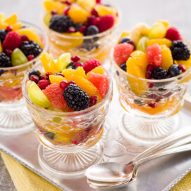 Colorful fresh fruit salad with seasonal fruit, great for breakfast and brunch.