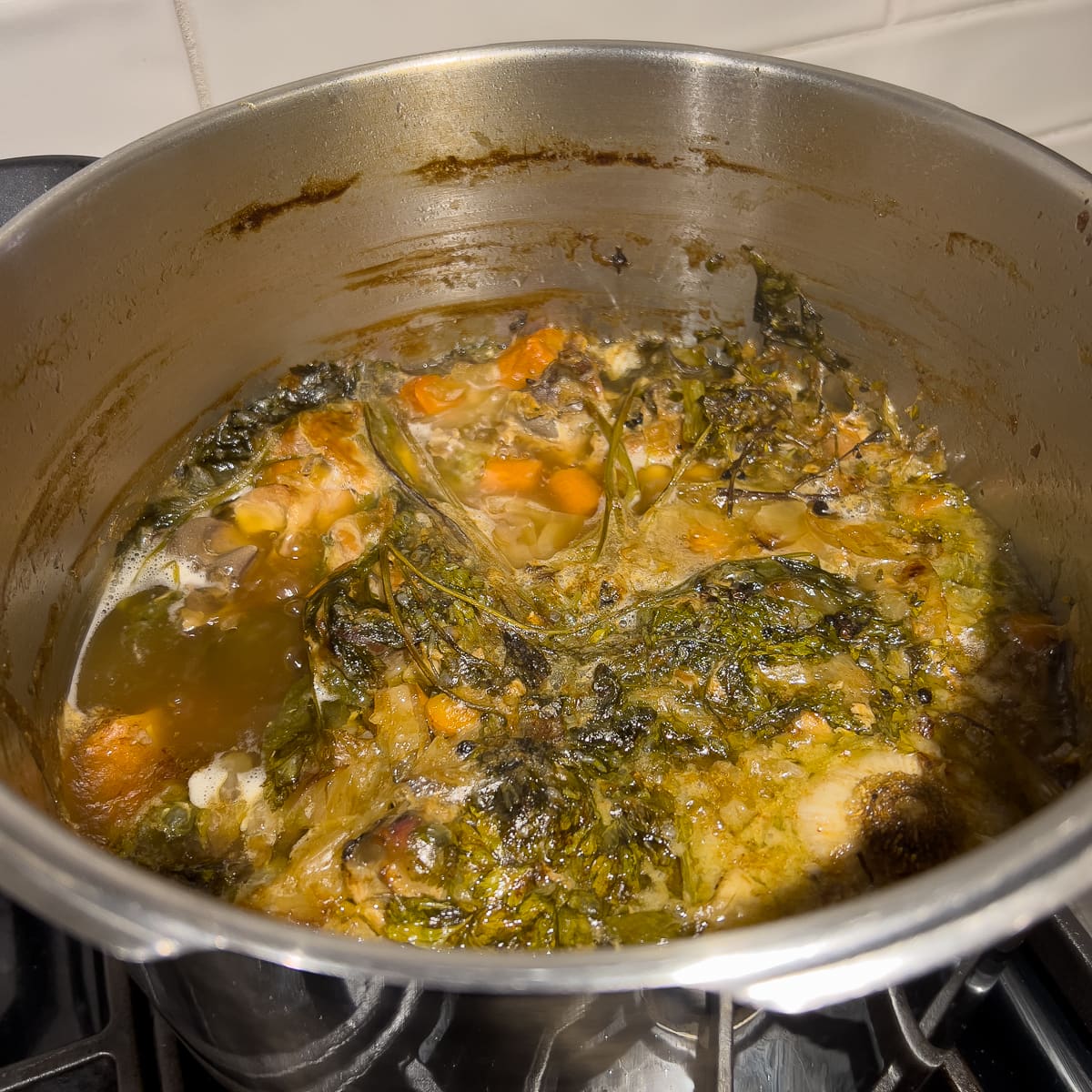 Simmering broth on the stovetop.