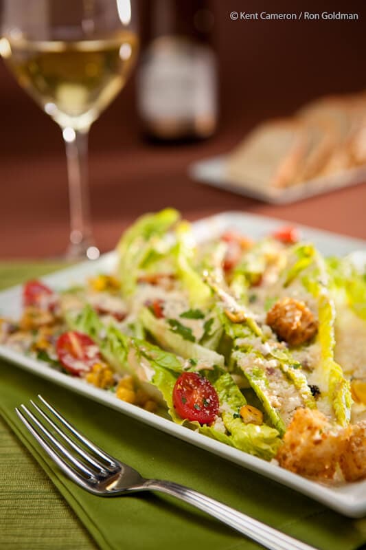 Homemade Caesar Salad with extra garnishes.