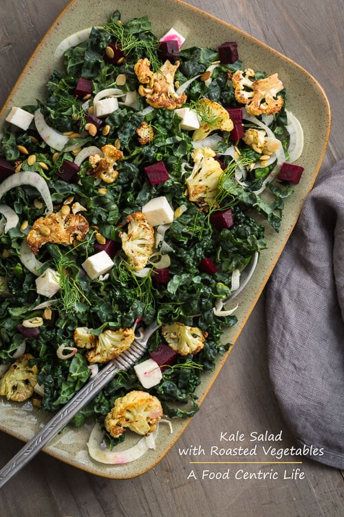 colorful kale salad on a platter.