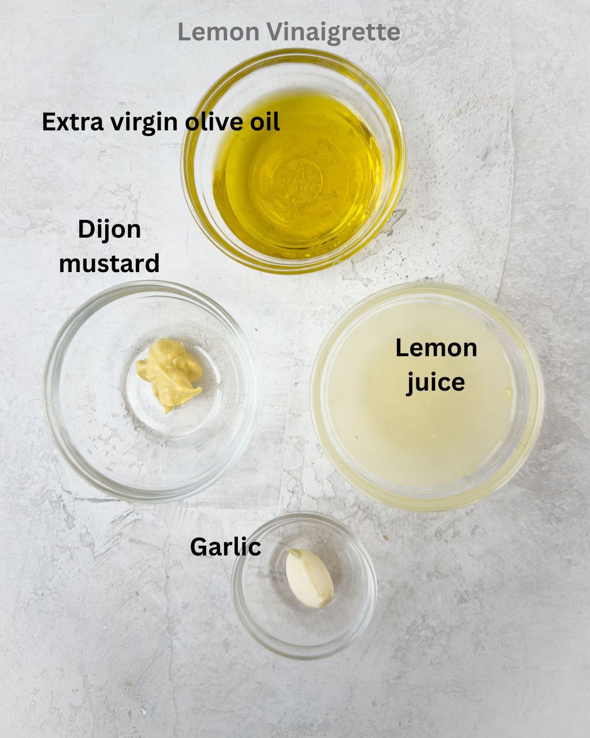 Extra virgin olive oil, lemon juice, dijon mustard, and garlic for a lemon vinaigrette.