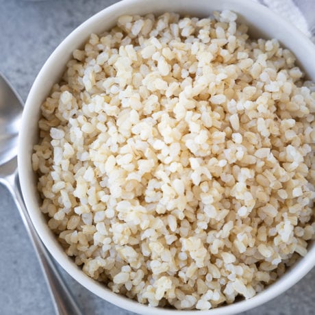 brown rice in white bowl | afoodcentriclife.com