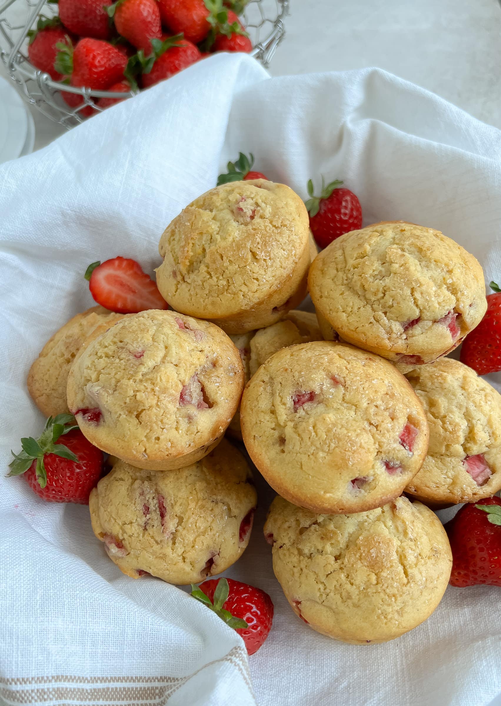 Basket of strawberry muffins.