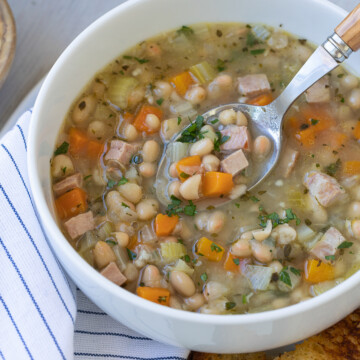 Navy bean soup with ham and vegetables.