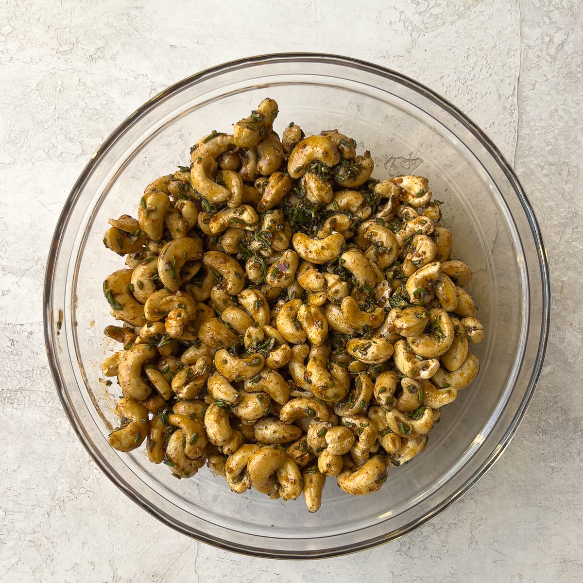 Cashews mixed with maple syrup and spices.