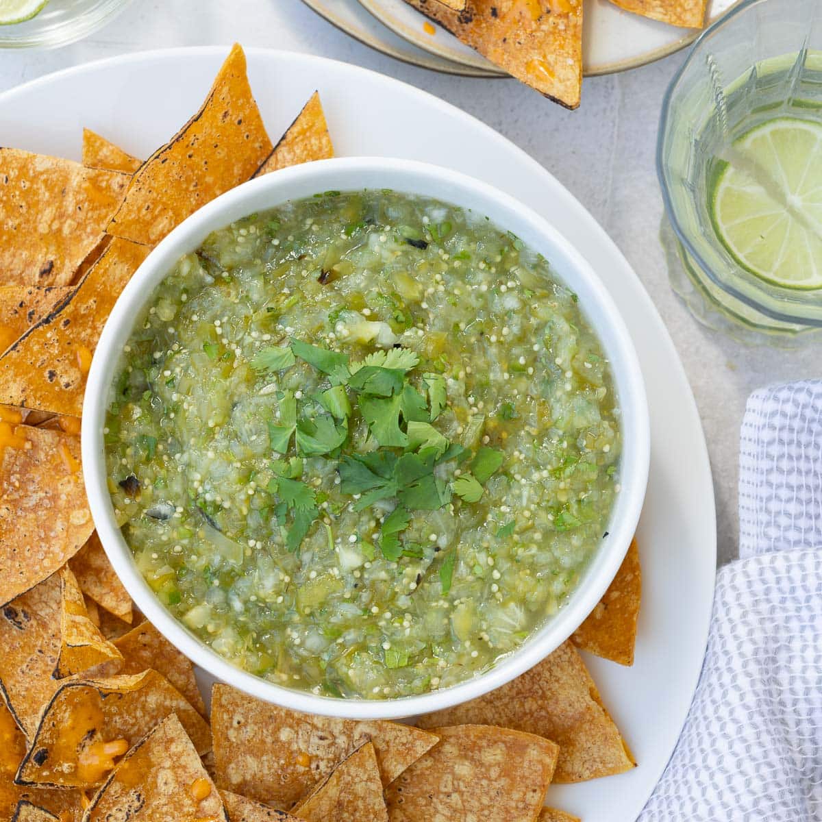 Beautiful chunky green salsa verde with toasted corn chips.