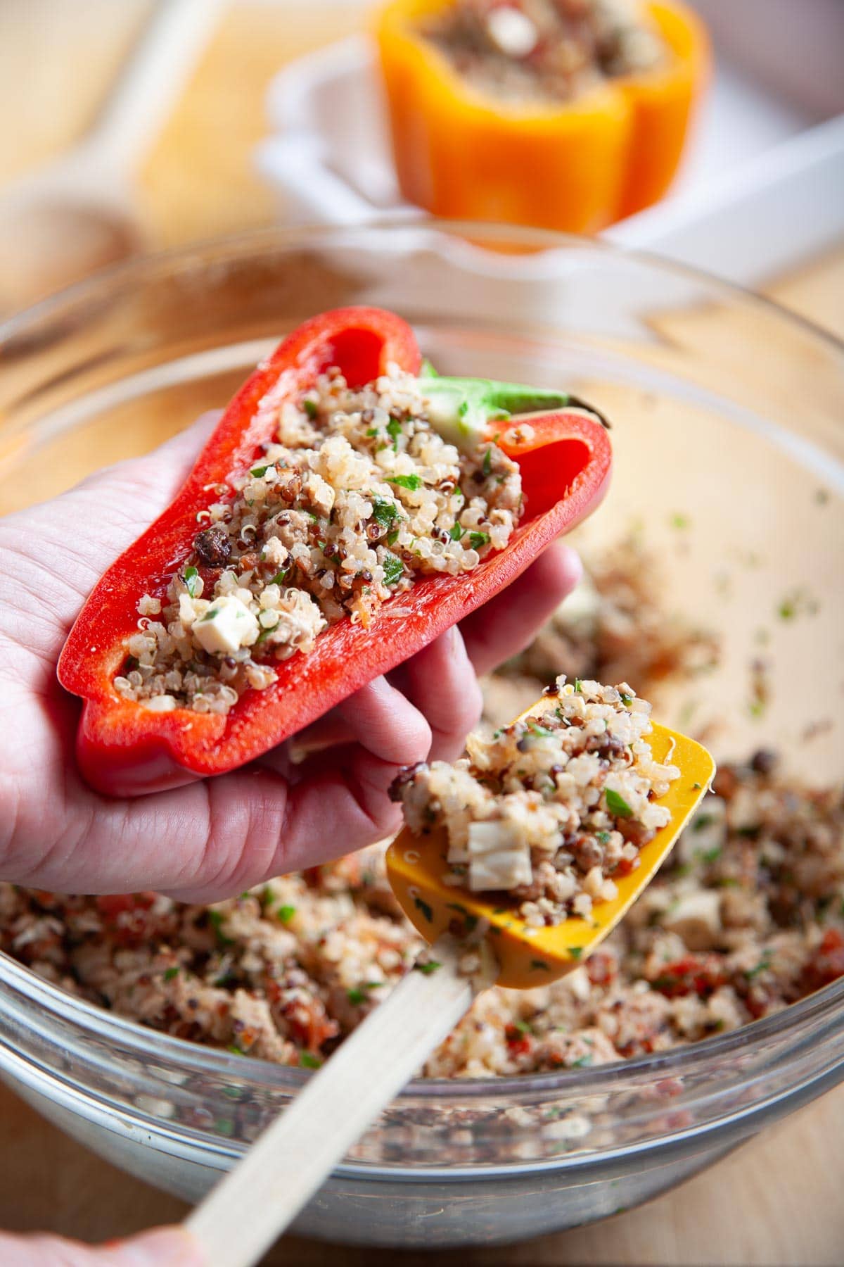 Red bell peppers stuffed with ground meat and cheese. 