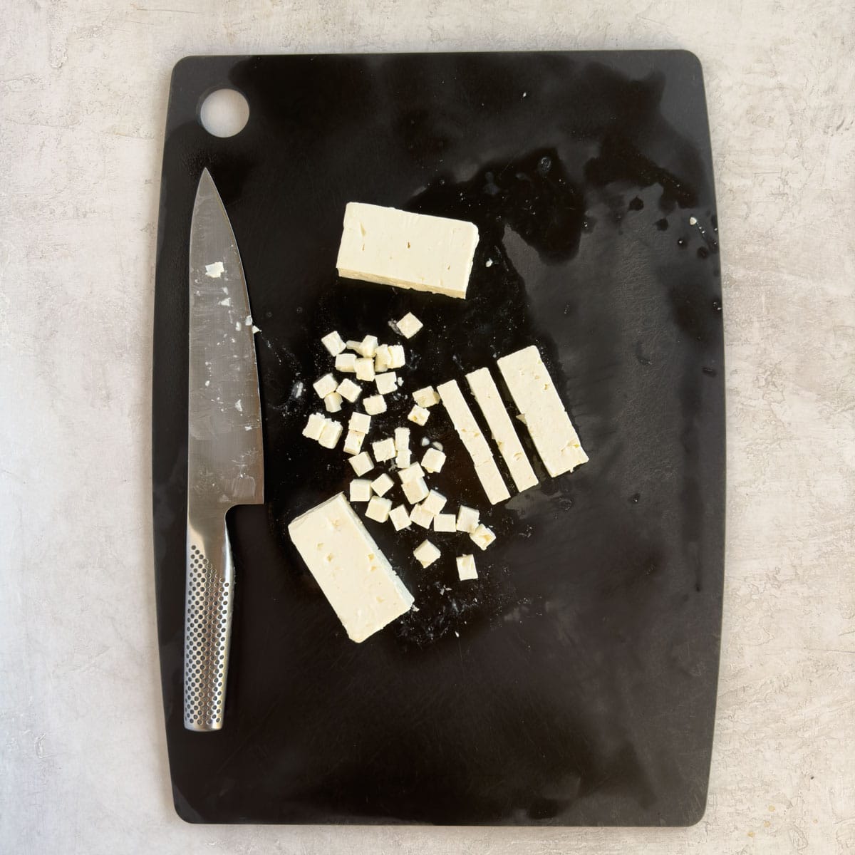 How to cut feta cheese into cubes for salad. 