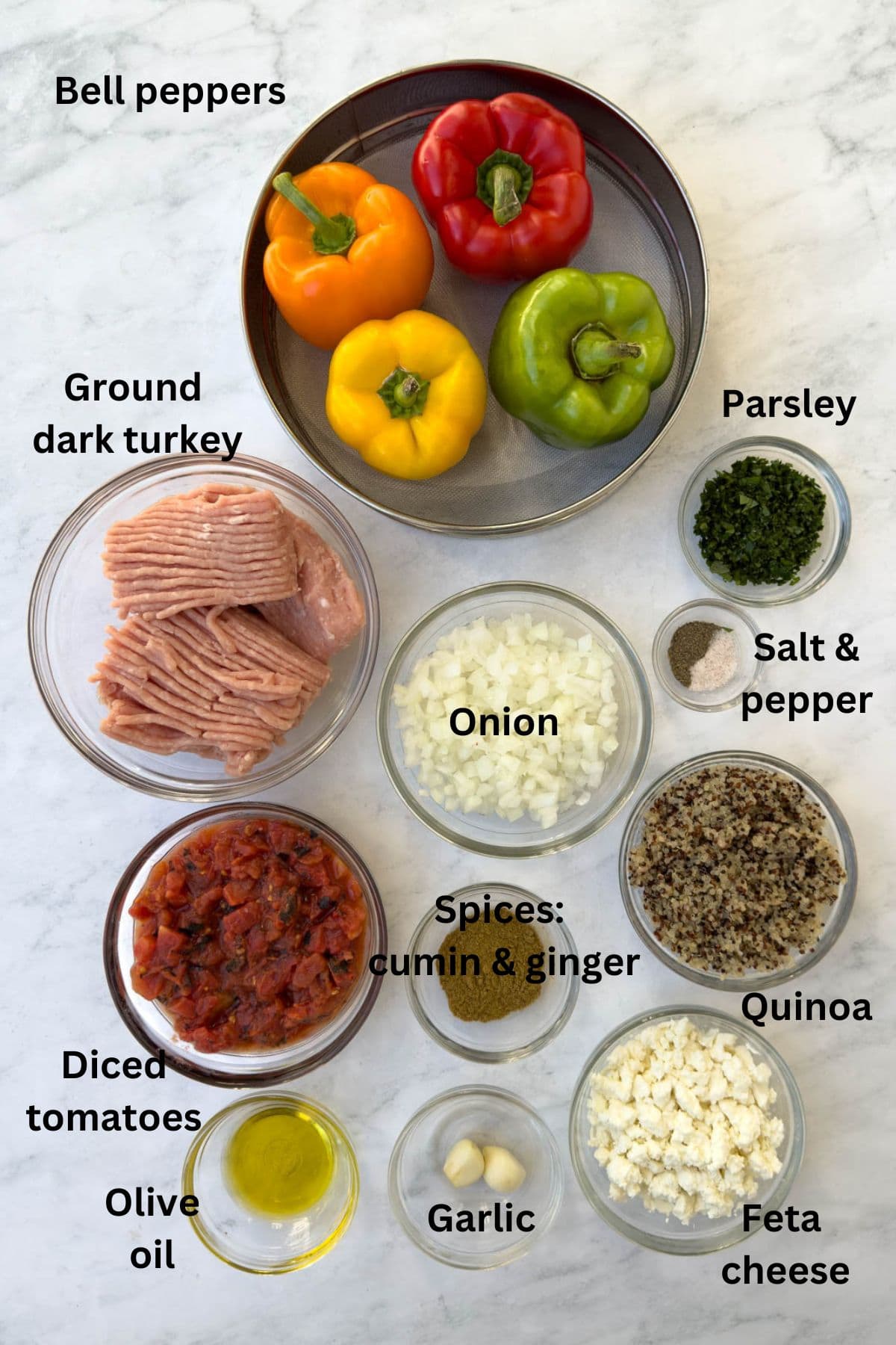 Ingredients for stuffed peppers with ground with turkey on the counter.