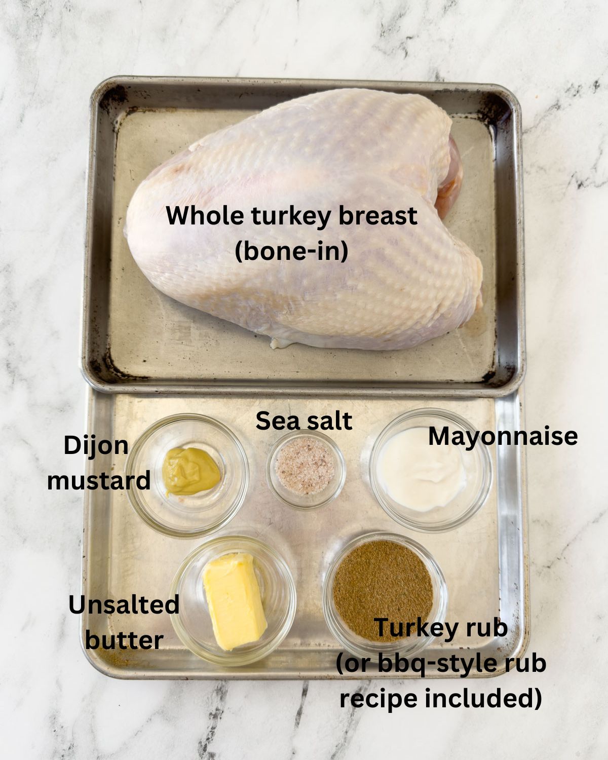 Ingredients for whole smoked turkey breast in a tray with prepped spices.