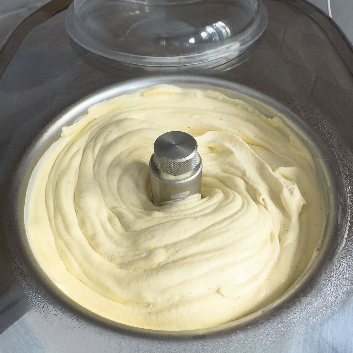 Vanilla bean ice cream after churning in an ice cream maker, ready for the freezer to set up.
