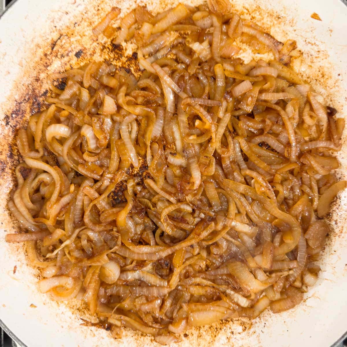 Onions finished being caramelized for french onion soup chicken.