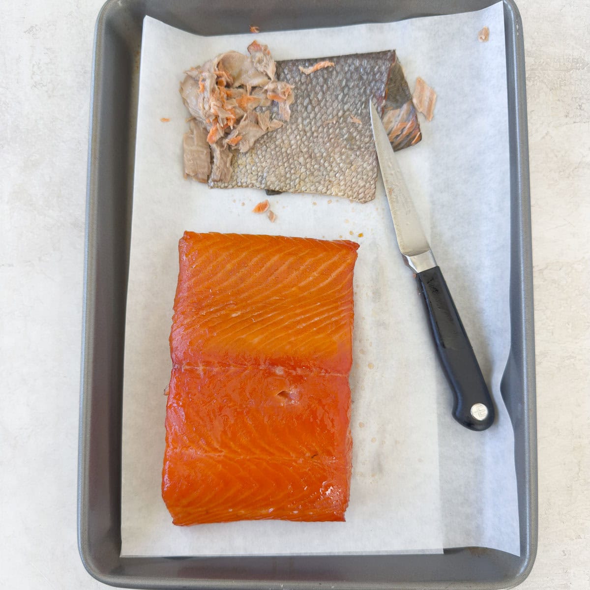 Finished and ready to serve, a pellet grill smoked salmon fillet. 