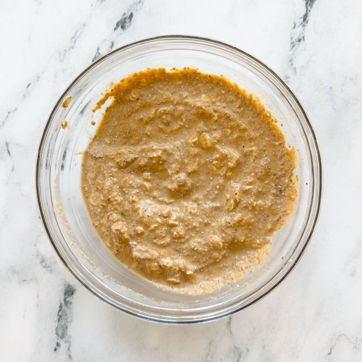 Mixed base of pumpkin overnight oats ready to be portioned and chilled.