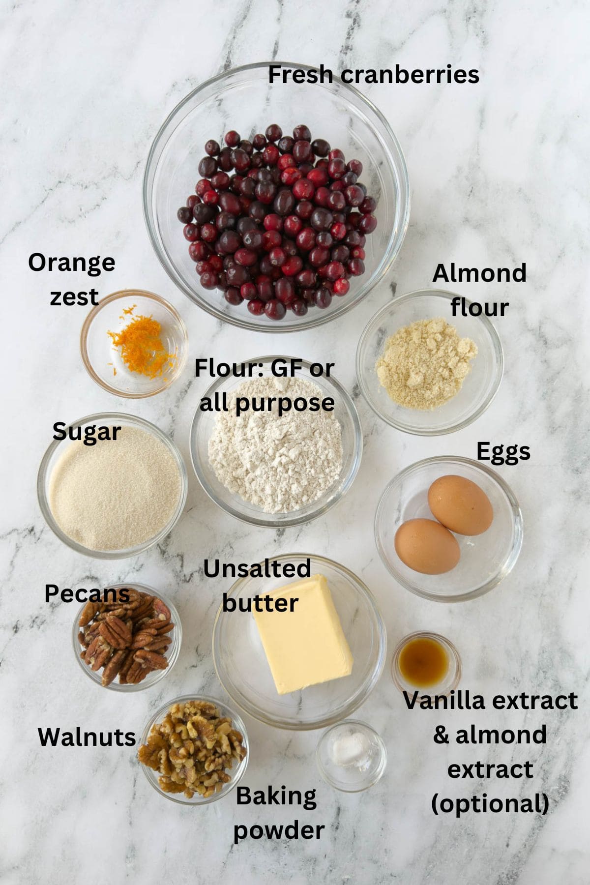 Ingredients for a Nantucket cranberry pie in prep bowls on the counter. 