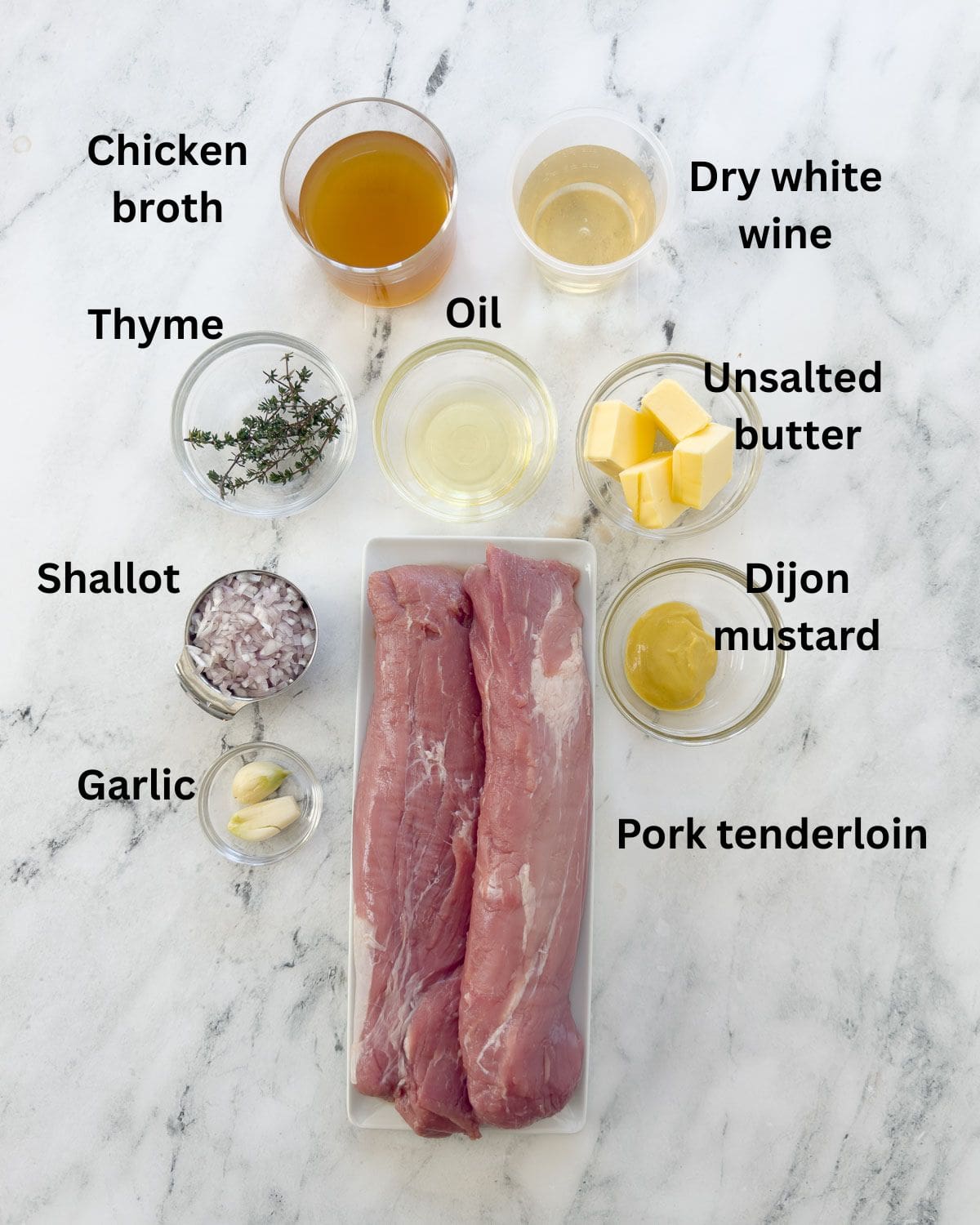 Prepped ingredients to make pork tenderloin medallions.