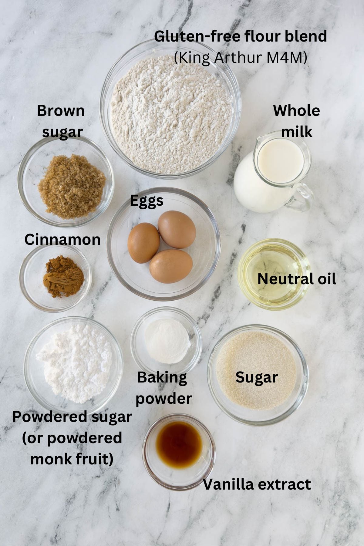 Ingredients for cinnamon muffins in prep bowls ready for making muffins.