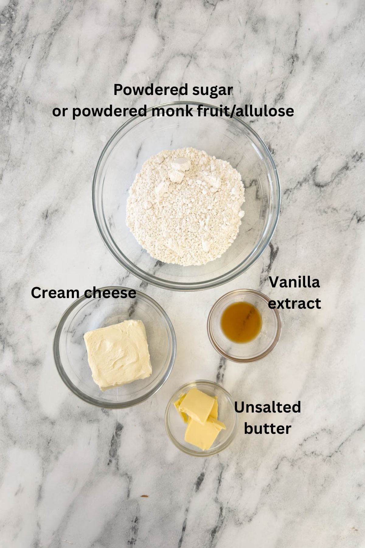 Ingredients for cream cheese frosting for carrot cake in prep bowls.