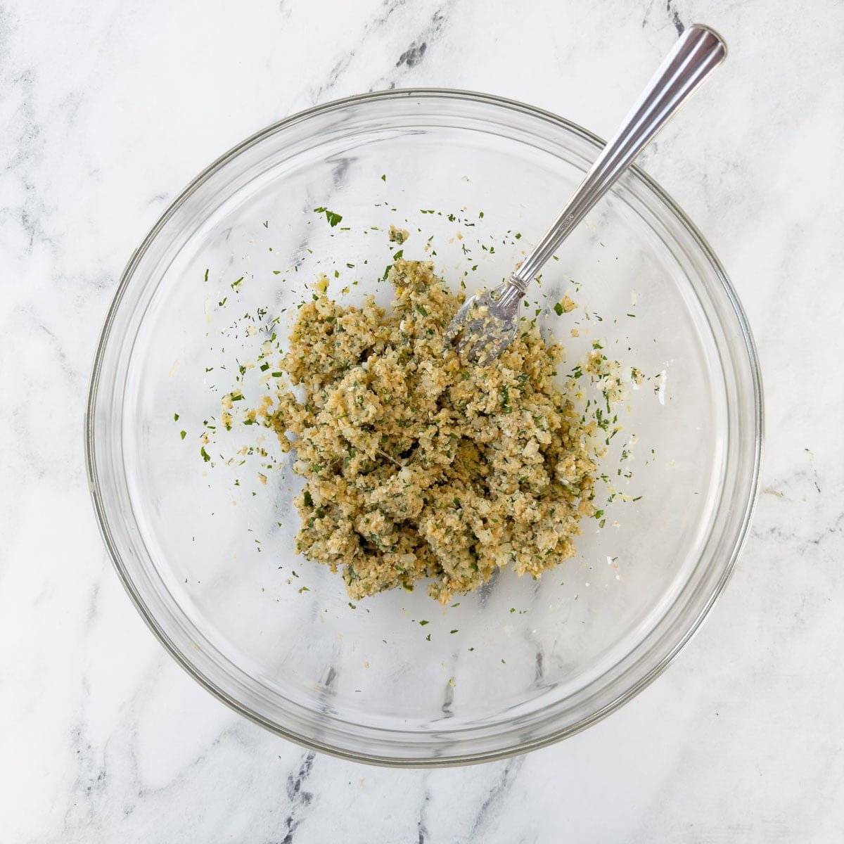 Mixed base ingredients for Greek chicken meatballs before the meat.