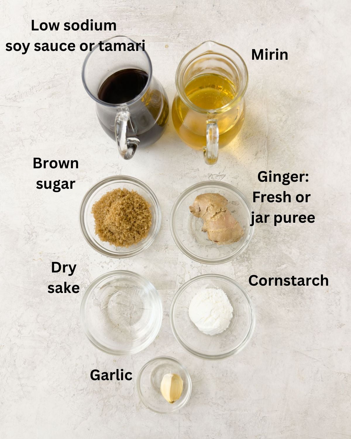 Ingredients for
homemade teriyaki sauce in prep bowls on counter.