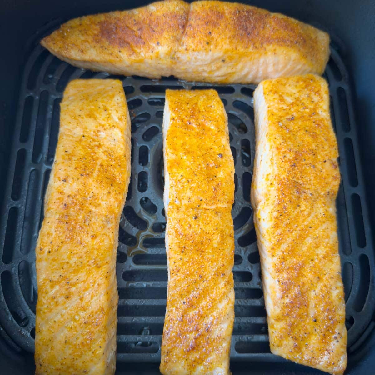 Air fryer salmon fillets finished and ready to serve.