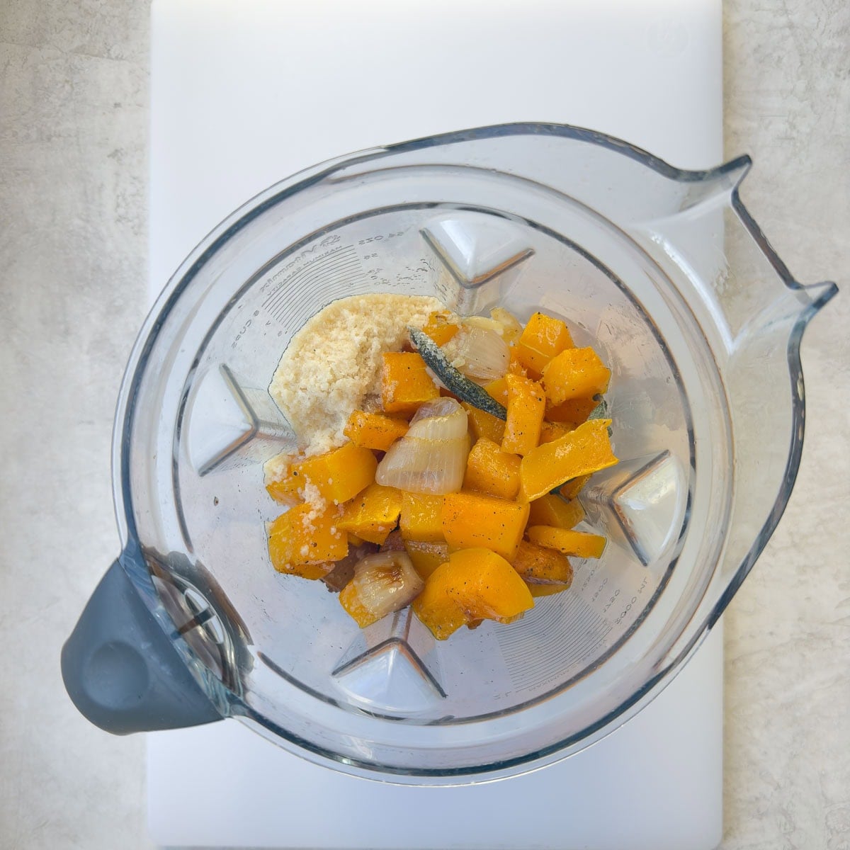 Ingredients for butternut pasta sauce in a blender for pureeing.