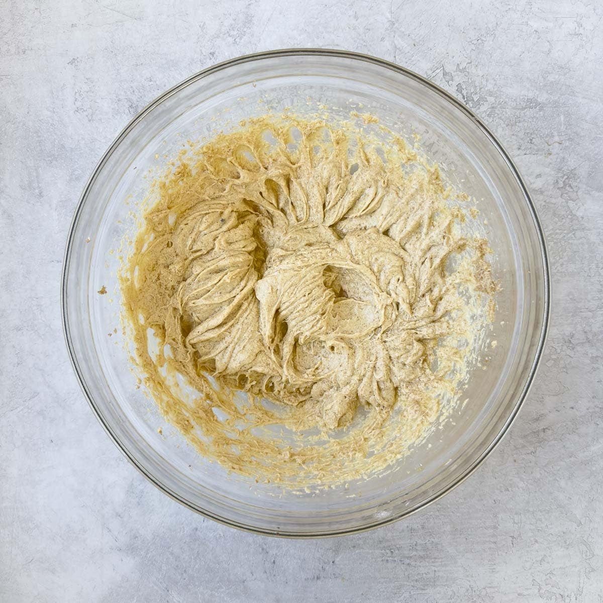 Beaten cookie dough for making GF soft chocolate chip cookies.